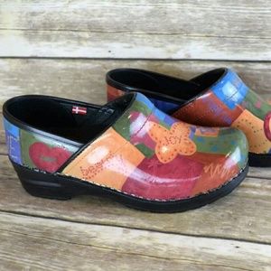 Sanita Shiny Leather Peace Sign Nursing Clogs
